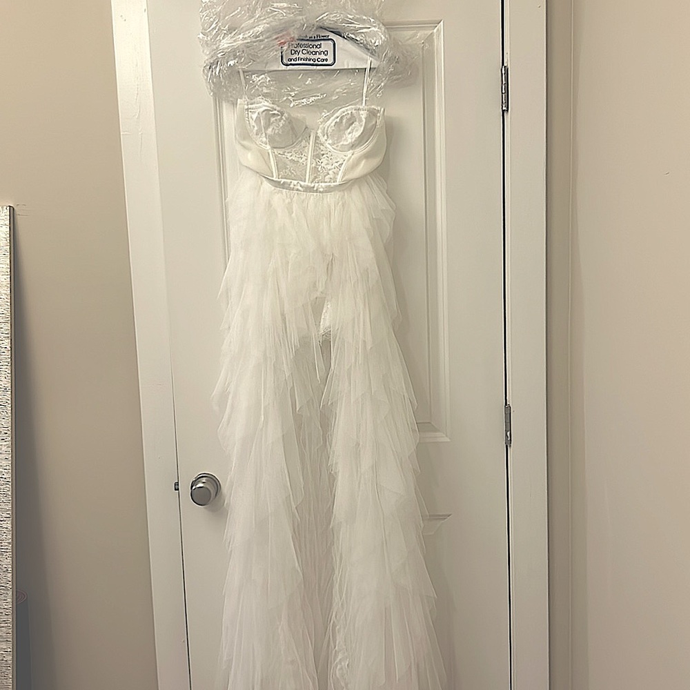 Bought as an elopement dress. Loved but went with something different!!